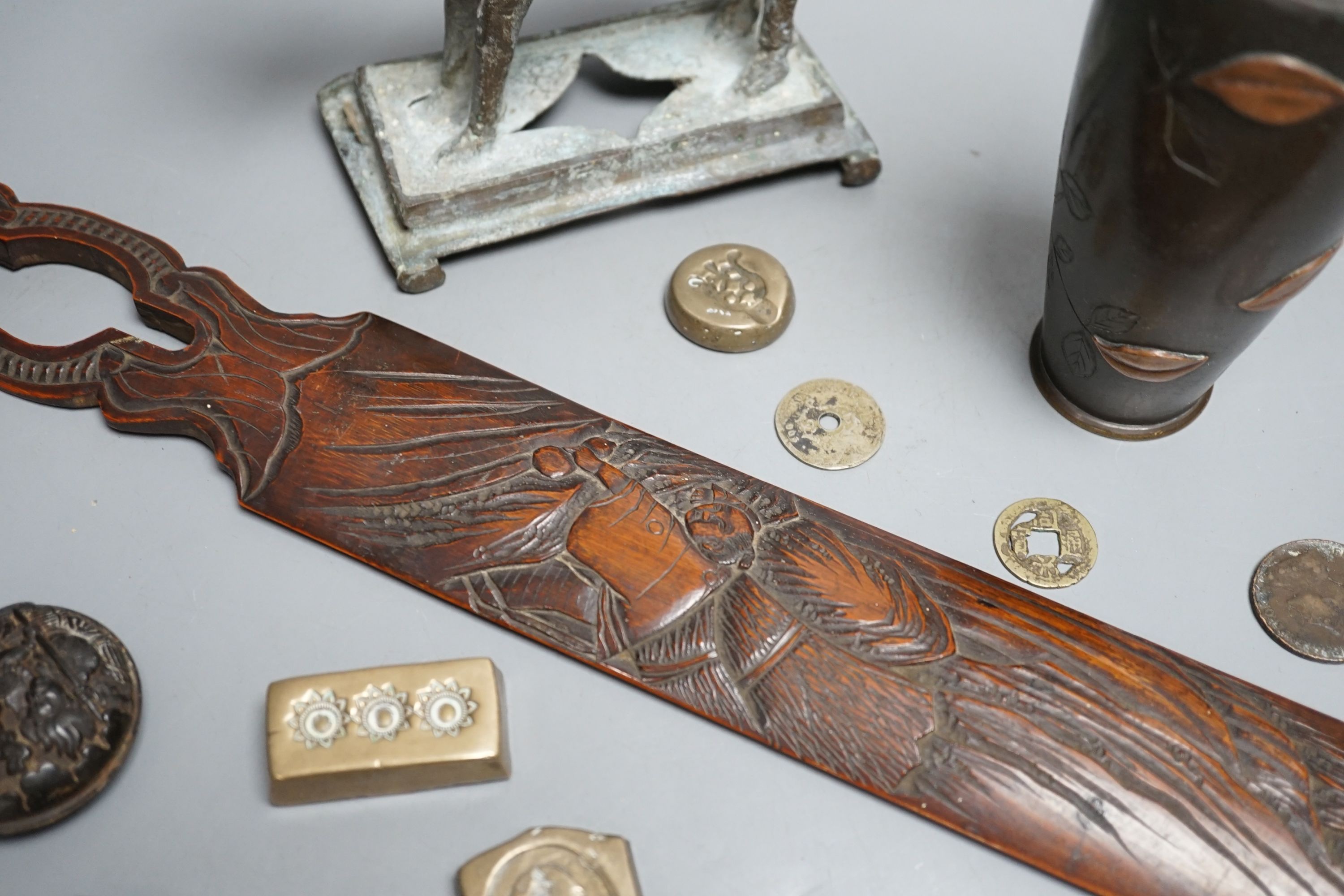A collection of Japanese and Indian objects, largest page Turner, 46cms long.